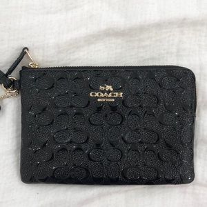 Small black Coach wristlet